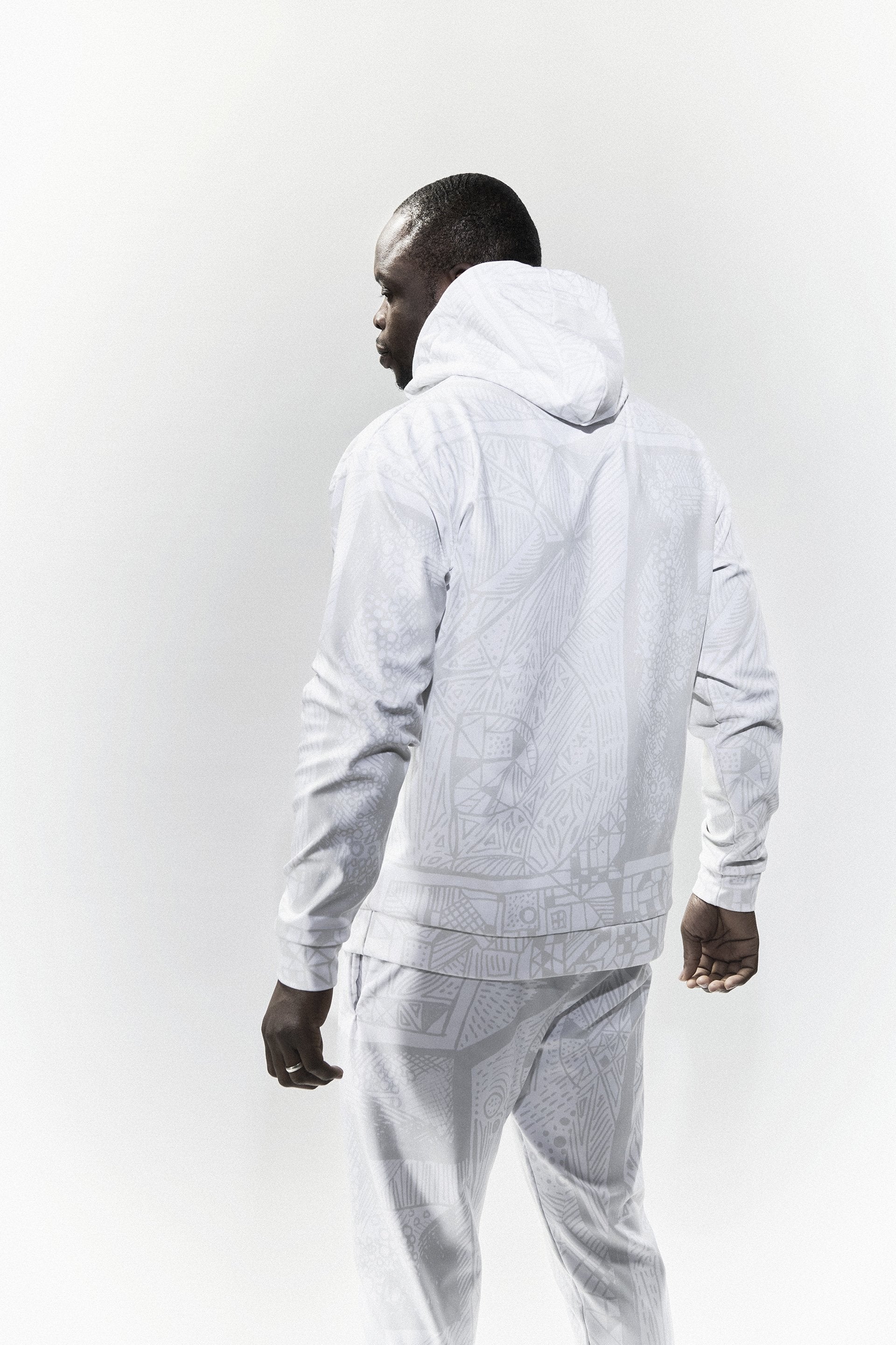 Model wearing BE White on White Hoodie and Joggers — eco fashion, high-vibrational design by Love & Other Necessities