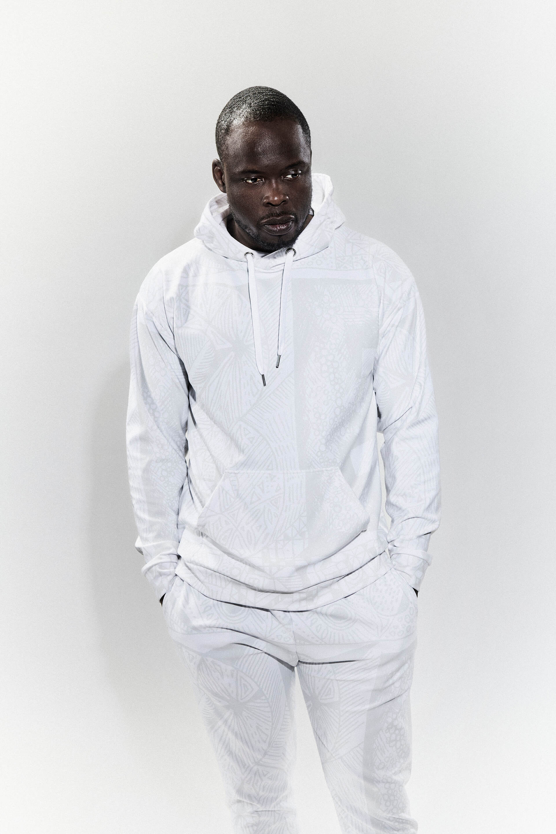 Model wearing BE White on White Hoodie and Joggers — eco fashion, high-vibrational design by Love & Other Necessities