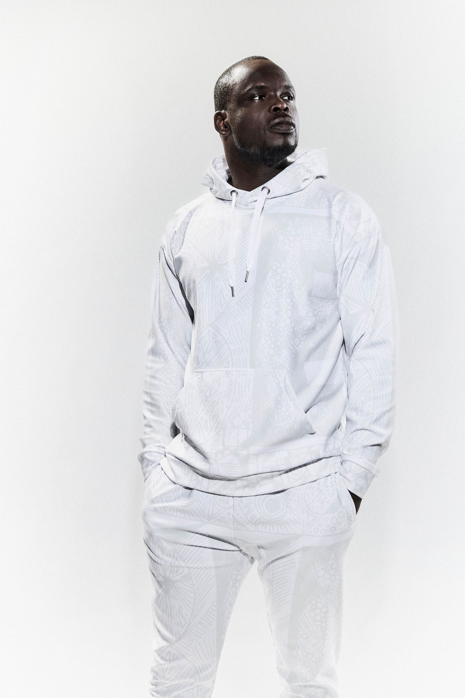 Model wearing BE White on White Hoodie and Joggers — eco fashion, high-vibrational design by Love & Other Necessities